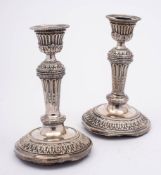 A pair of Victorian silver candlesticks, maker John Aldwinckle & Thomas Slater, London,