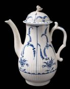 A First Period Worcester blue and white coffee pot and cover: of reeded baluster form with bud