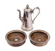 A Sheffield plate coffee pot: of cylindrical tapering outline with domed hinged lid having a