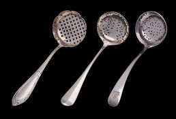 A George V silver Old English pattern sifting spoon, maker Goldsmiths & Silversmiths Co Ltd, London,