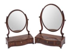 Two similar George III mahogany dressing table mirrors,: late 18th century,