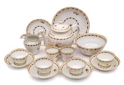A First Period Worcester porcelain part tea service: of wrythen fluted form decorated in blue and