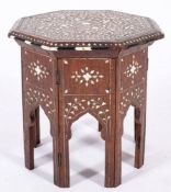 An Anglo-Indian bone marquetry and ebony strung hardwood low occasional table, northern India,
