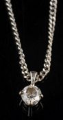 A diamond pendant,: the brilliant cut diamond, estimated to weigh 0.