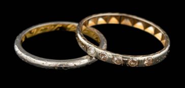 A diamond ring,: the band set with eight cut diamonds, ring size N 1/2; and a gold coloured band,