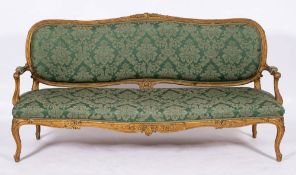 A carved and giltwood and upholstered canape in Louis XV taste, late 19th /early 20th century,