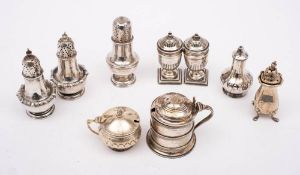 A collection of assorted silver condiments, various makers and dates: including mustard pots,