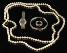 A cultured pearl necklace,: the 7mm uniform cultured pearls on a knotted string,