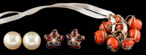 A group of coral buttons,: the coral beads with snakes,