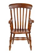 A Victorian elm, oak and beech lath back elbow chair, second half 19th century,