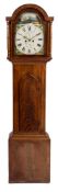 A Georgian mahogany long case clock: the eight-day duration movement striking the hours on a bell,