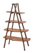 A set of burrwood open display shelves, 20th century,