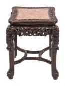 A Chinese carved hardwood and rouge marble inlaid stand, late 19th century,