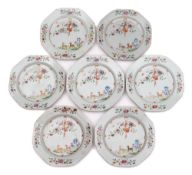 A set of seven Chinese famille rose plates: of shaped octagonal form,