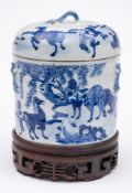 A Chinese porcelain food container and cover: of cylindrical form with faux bamboo handles painted