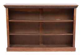 An oak open bookcase in 19th century style,
