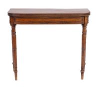 A Regency mahogany tea table, early 19th century,: the 'D' shaped hinged top with reeded edges,