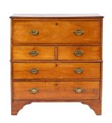 A George III hardwood campaign secretaire chest of drawers, circa 1800,: in two sections,