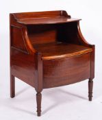 A George III mahogany bowfront commode, circa 1770,