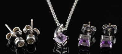 WITHDRAWN A pair of diamond ear studs,: each set with a brilliant cut diamond, approximately 0.