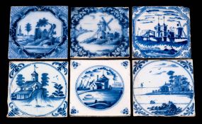 A group of six 18th century English blue and white delftware tiles: comprising ruined buildings