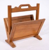 Workshop of Robert 'Mouseman' Thompson (Kilburn), an English oak newspaper and magazine rack,