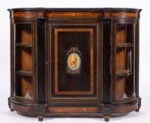 A Victorian ebonised wood, amboyna marquetry and porcelain mounted credenza, circa 1880,