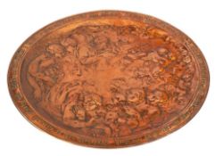 A mid 19th century large copper plaque: the centre decorated with classical maidens and putti in
