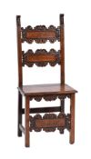 A Charles II carved walnut backstool, circa 1670 and later elements,