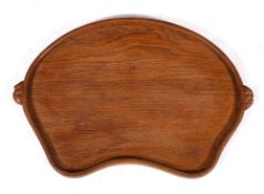 Workshop of Robert 'Mouseman' Thompson (Kilburn), an English oak tray,: kidney shaped,