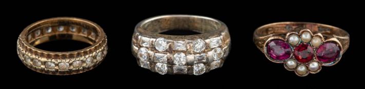 A 9 carat gold garnet and seed pearl ring,
