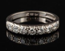 A diamond half eternity ring,: set with brilliant cut diamonds, approximately 0.