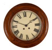 An Edwardian French mahogany wall clock: the eight-day duration movement striking the hours on a