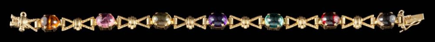 A 9 carat gold multi gem set bracelet,: set with oval cabochon smoky quartz, garnet, aquamarine,