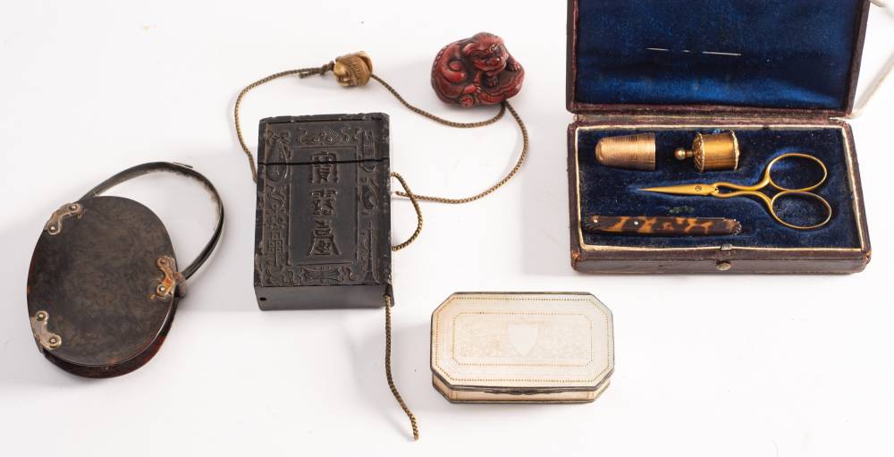 A Japanese lacquered single section inro: with moulded decoration,