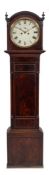 A Regency mahogany longcase clock: the eight-day duration movement striking the hours on a bell,