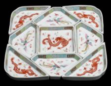 A Chinese famille rose nine-piece 'dragon and phoenix' supper set: each piece enamelled with a