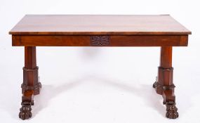 A George IV mahogany library table, circa 1825,: with rectangular top,