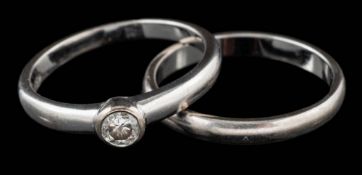 An 18 carat gold diamond ring,: the brilliant cut diamond, estimated to weigh 0.