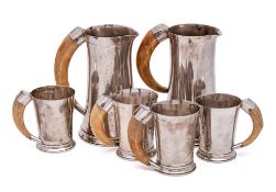 A matched set of silver beer jugs and mugs, maker Goldsmiths & silversmiths Co Ltd, London, 1937,