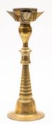 An Indo- Persian bronze lamp: of inverted trumpet-shaped outline,