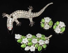 A silver salamander brooch by Butler and Wilson,: set with circular cut white paste,