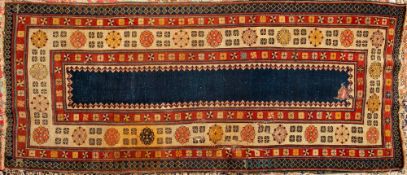 A Talish runner:, late 19th Century, the central indigo panel with serated and arrow head designs,