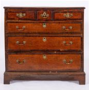 A George III oak and walnut banded chest of drawers, last quarter 18th century,