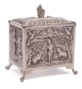 An Indian silver tea caddy: of rectangular outline, with shallow domed hinged lid,