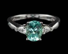 A greenish blue tourmaline and diamond ring,