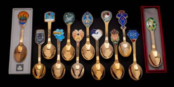 Thirteen Danish silver gilt and enamel Christmas spoons,