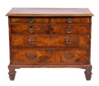 A George II walnut and crossbanded chest of drawers, mid 18th century,