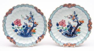 A pair of Chinese famille rose lobed dishes: painted with peony,