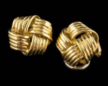 A pair of 18 carat gold knot ear clips,: stamped 750 with full London hallmarks, with clip fittings,